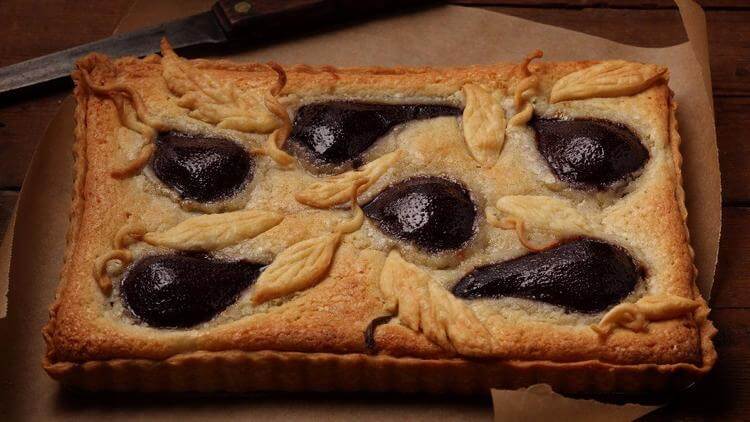 What to do with fall pears: Poach in wine, stick into an almond tart